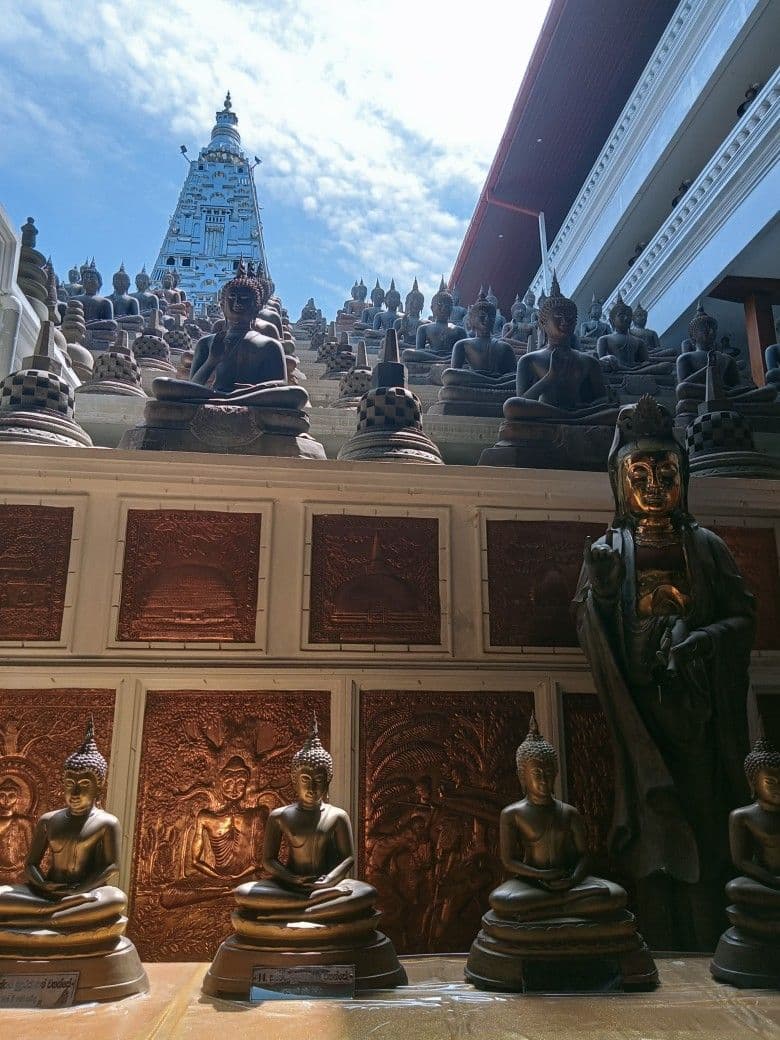 Rows of Buddha statues inside Gangaramaya Temple, Colombo
